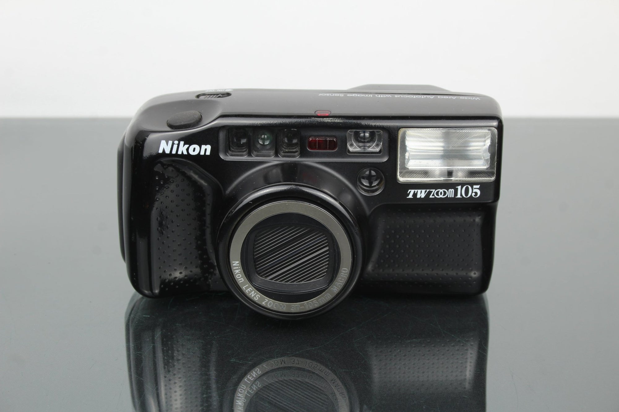 Nikon TW zoom 105 - Dutch|Thrift