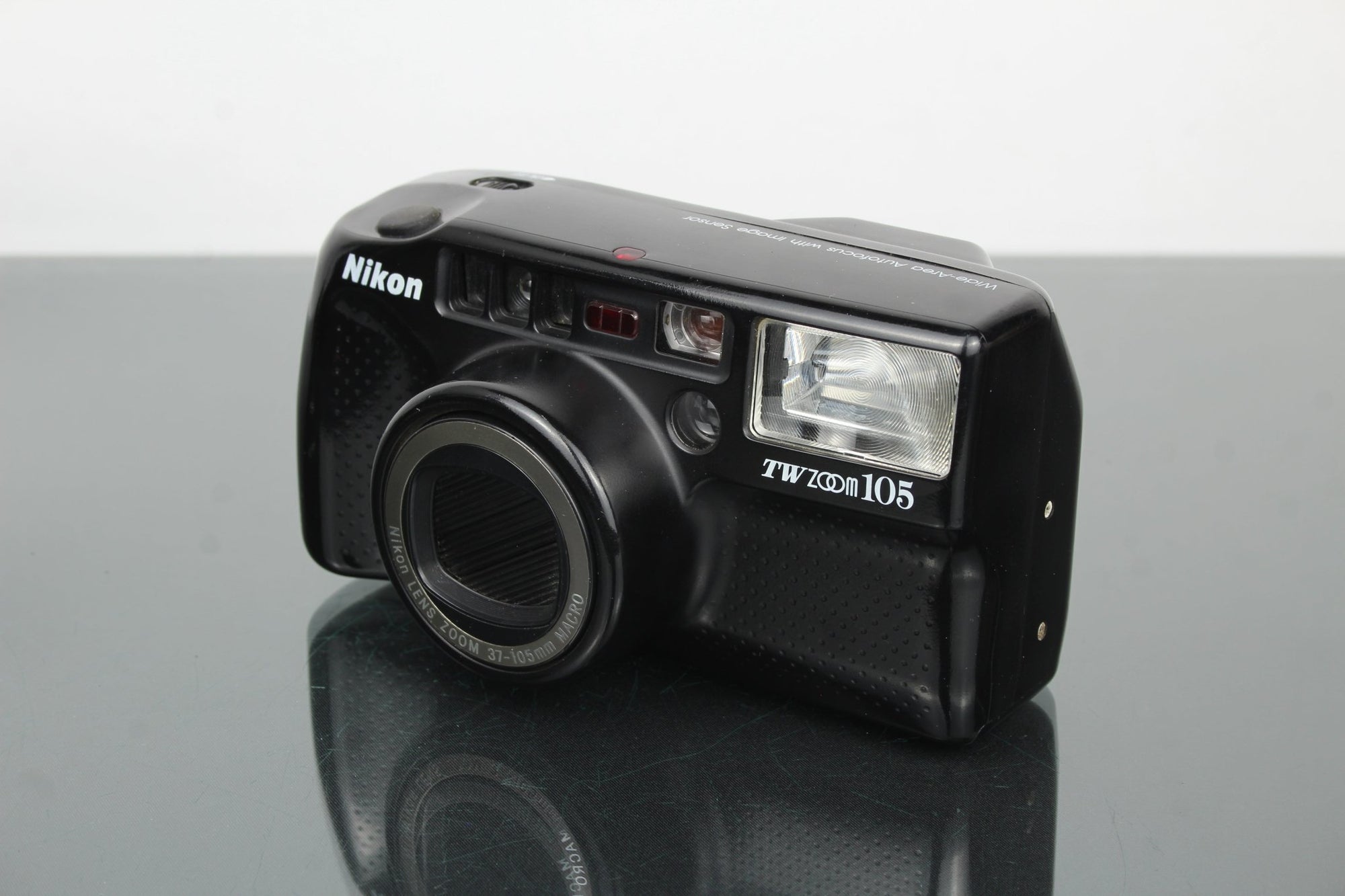 Nikon TW zoom 105 - Dutch|Thrift